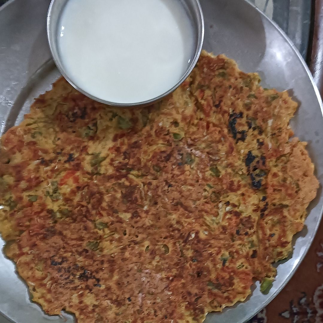 Besan uttapam with curd or butter milk