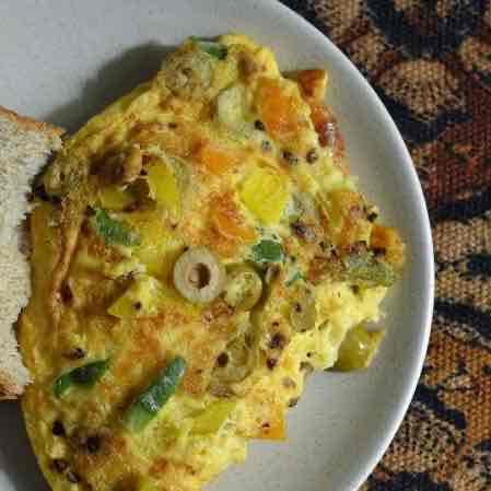 Egg Omelette With Olives And Cheese
